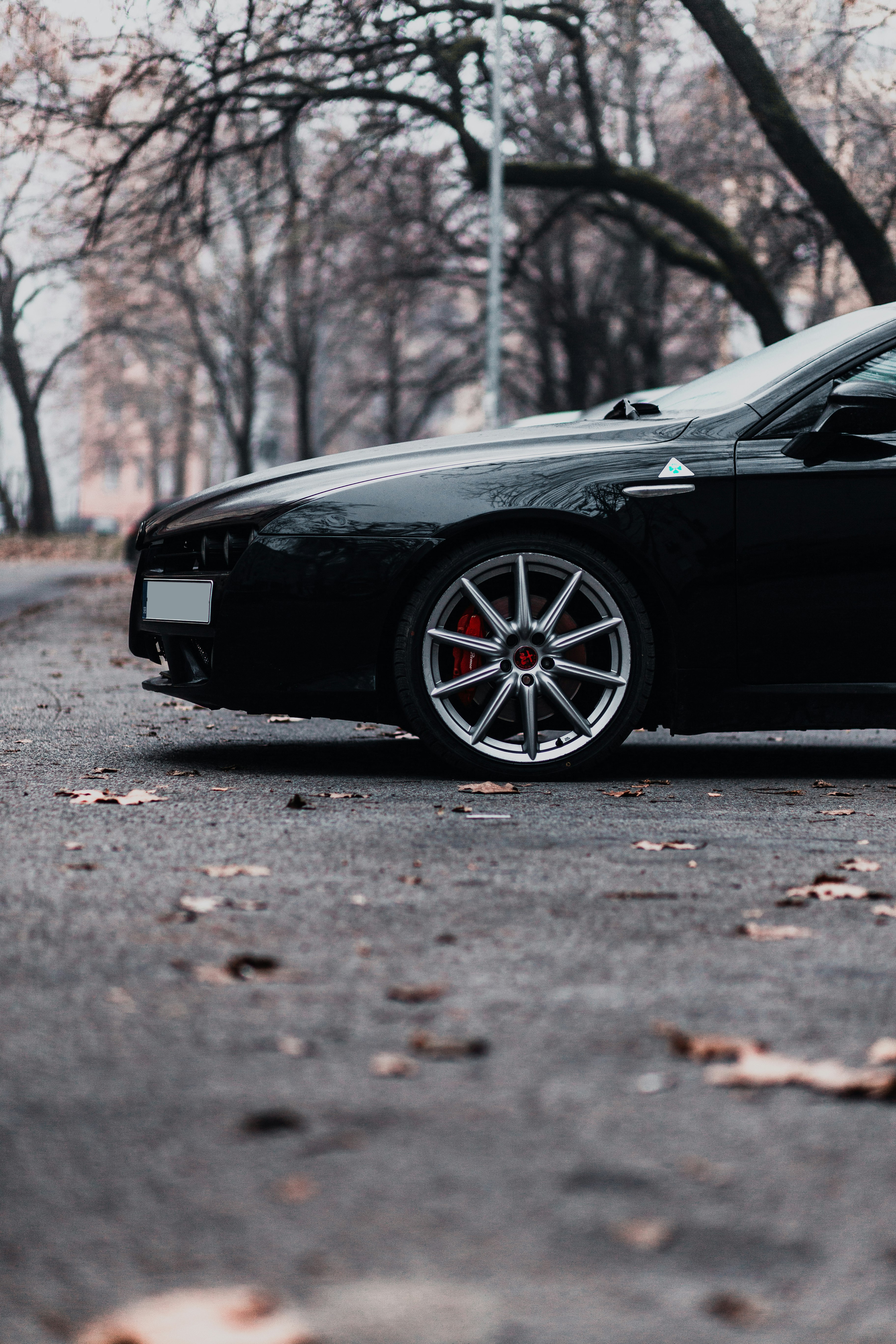 black car on road during daytime